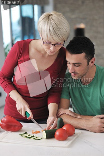 Image of young couple have fun in modern kitchen