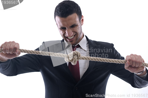 Image of business man with rope isolated on white background