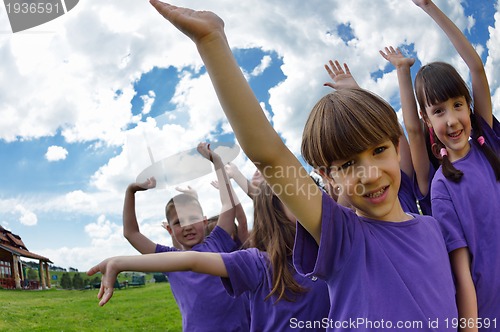 Image of happy kids group  have fun in nature