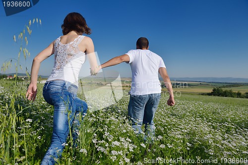 Image of happy couple in wheat field