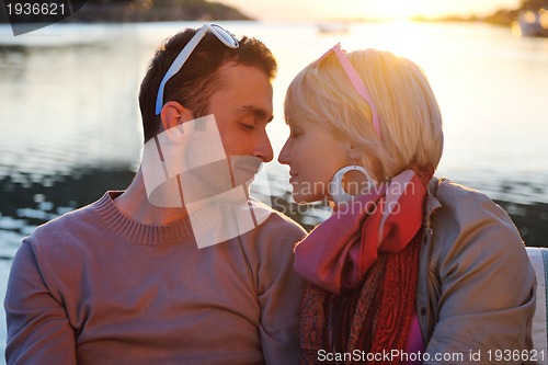 Image of couple in love  have romantic time on boat