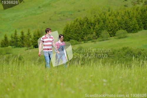 Image of romantic young couple in love together outdoor