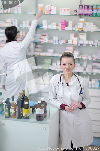 Image of team of pharmacist chemist woman  in pharmacy drugstore