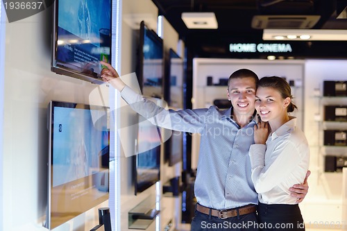 Image of people buy  in consumer electronics store