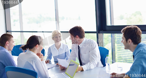 Image of business people in a meeting at office