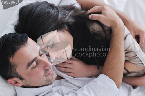 Image of happy young couple relax at home