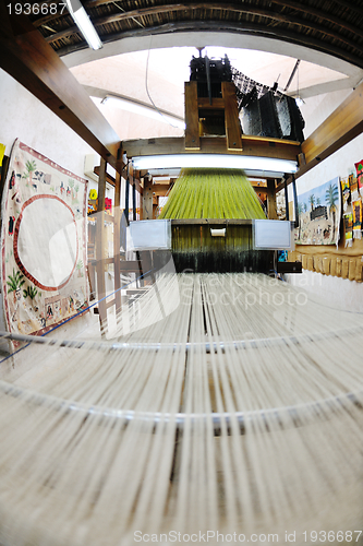 Image of traditional arabic rug production