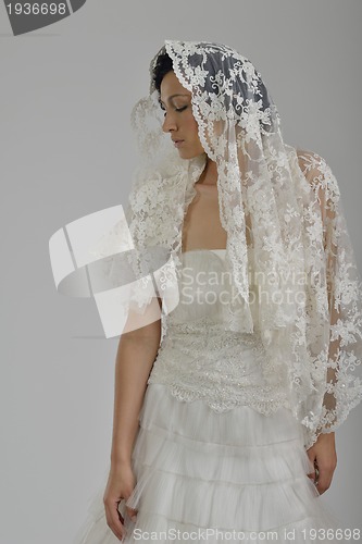 Image of Portrait of a beautiful woman dressed as a bride