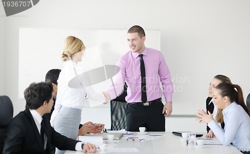 Image of Group of young business people at meeting