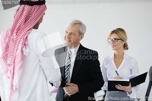 Image of Arabic business man at meeting