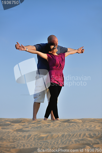 Image of couple enjoying the sunset