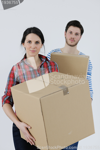 Image of Young couple moving in new house