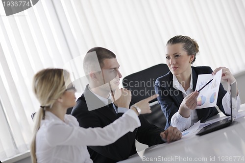 Image of business people in a meeting at office