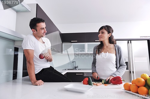 Image of young couple have fun in modern kitchen