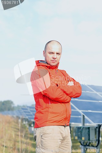 Image of Male solar panel engineer at work place