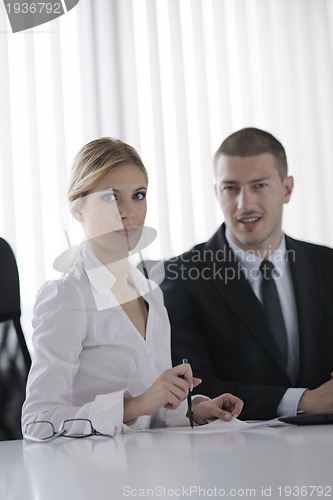 Image of business people in a meeting at office