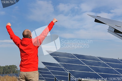 Image of Male solar panel engineer at work place