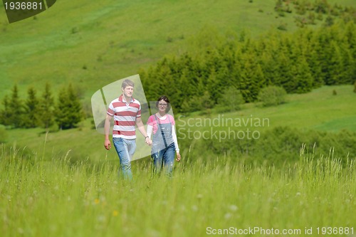 Image of romantic young couple in love together outdoor