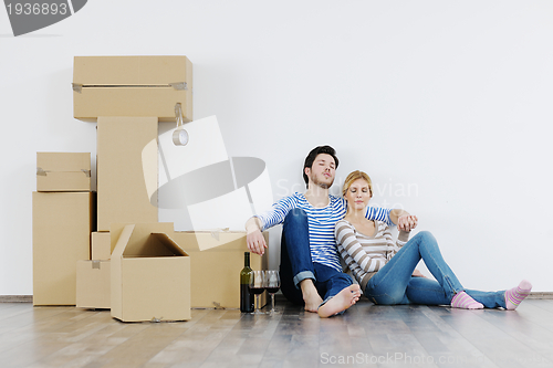 Image of Young couple moving in new house