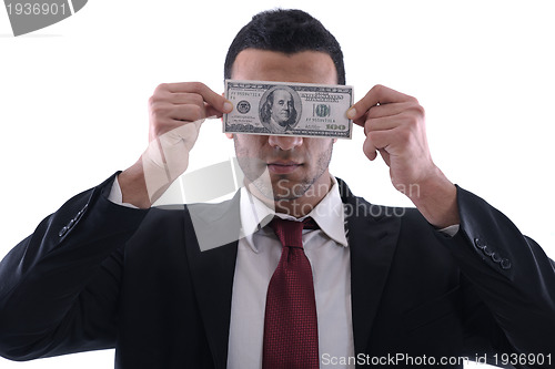 Image of Business man holding money