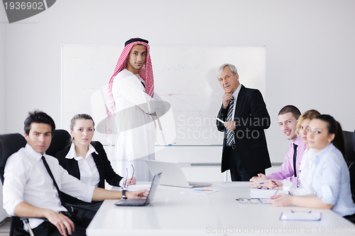 Image of Arabic business man at meeting