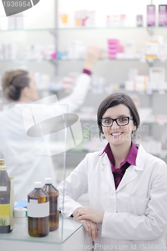 Image of team of pharmacist chemist woman  in pharmacy drugstore