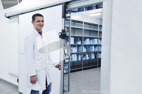 Image of medical factory  supplies storage indoor