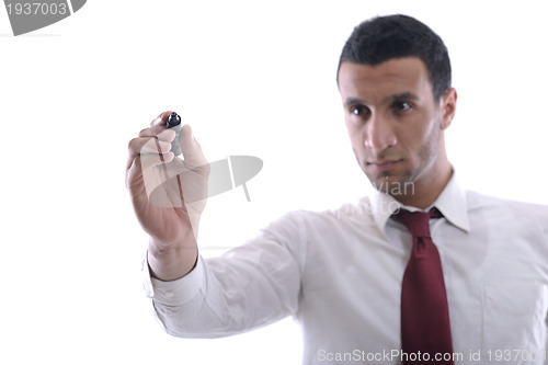 Image of business man draw with marker on empty space