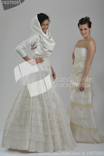 Image of portrait of a three beautiful woman in wedding dress