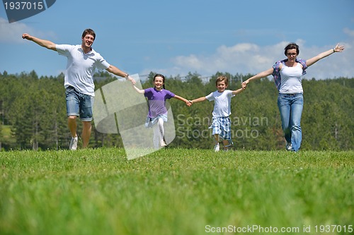 Image of happy young family have fun outdoors