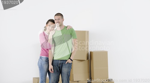 Image of Young couple moving in new home