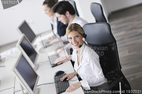 Image of business people group working in customer and help desk office