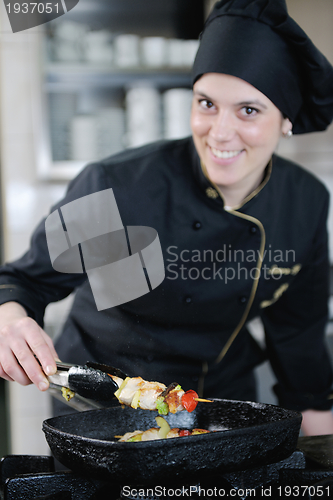 Image of chef preparing meal