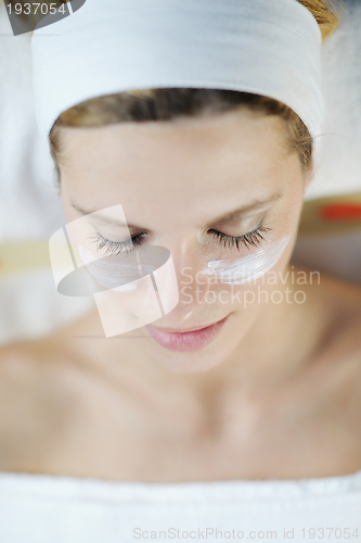 Image of Beautiful young woman in spa