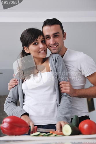 Image of young couple have fun in modern kitchen