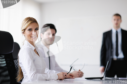 Image of business people in a meeting at office