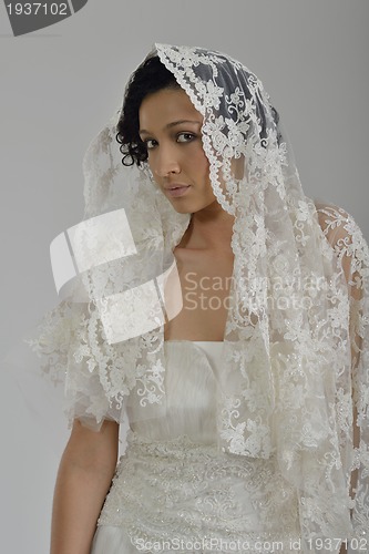 Image of Portrait of a beautiful woman dressed as a bride