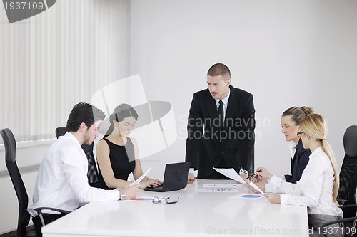 Image of business people in a meeting at office