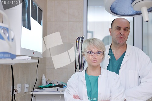 Image of veterinarian and assistant in a small animal clinic