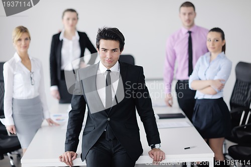 Image of young business man at meeting