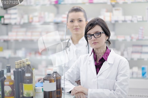 Image of team of pharmacist chemist woman  in pharmacy drugstore