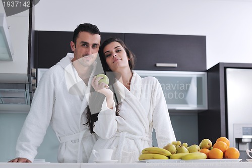 Image of young couple have fun in modern kitchen
