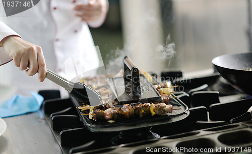 Image of chef preparing meal