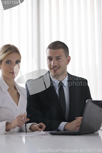 Image of business people in a meeting at office