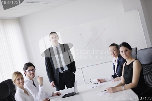 Image of business people in a meeting at office
