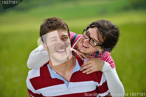 Image of romantic young couple in love together outdoor