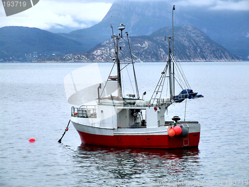 Image of Fishing boat on anchor in haven