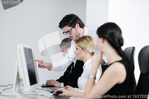 Image of business people group working in customer and help desk office