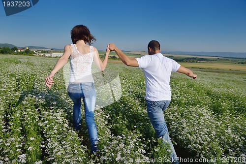 Image of happy couple in wheat field