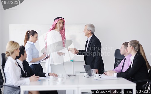 Image of Arabic business man at meeting